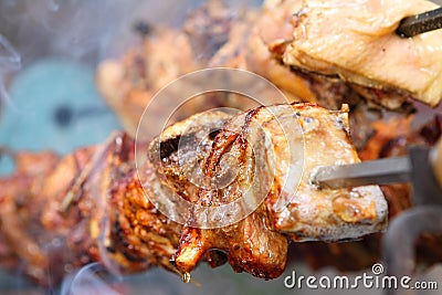 Meat on rotisserie Stock Photo