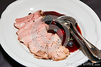 Meat in sauce with berries Stock Photo