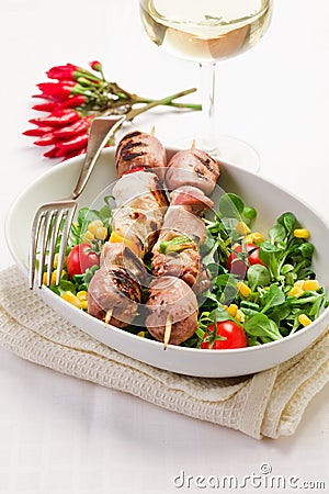 Meat Skewers on white table Stock Photo