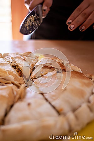 meat tart cut into individual portions Stock Photo