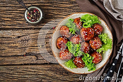 Meatballs with beef in sweet and sour sauce. Asian food. Stock Photo