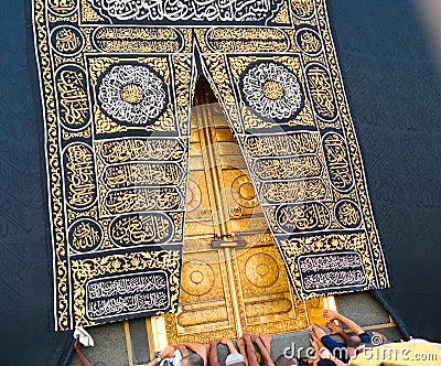 Holy Kaaba door in the holy mosque during tawaf when umra Editorial Stock Photo