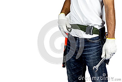 Mechanic or engineer standing on white background and holding wrench on hand Stock Photo