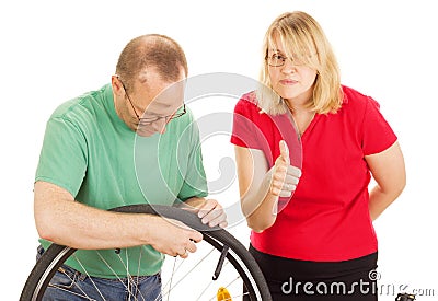 A mechanic repairs a bicycle Stock Photo
