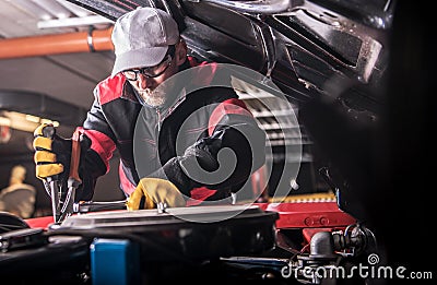 Mechanic Restoring Car Stock Photo