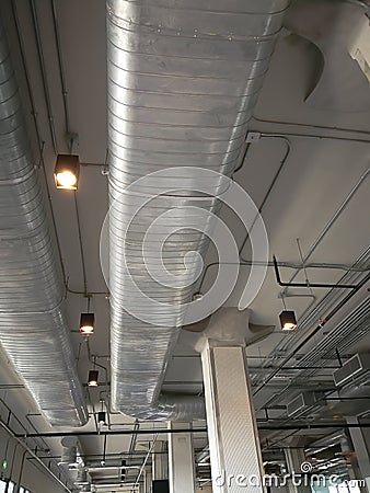 Mechanical and electrical work is laid prior to ceiling installation Stock Photo