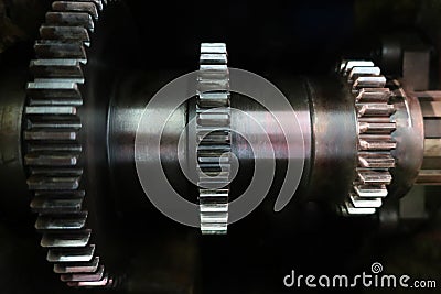 Mechanical gearwheel on an industrial machine, closeup Stock Photo