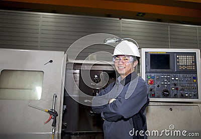 Mechanical technician of cnc machine Stock Photo