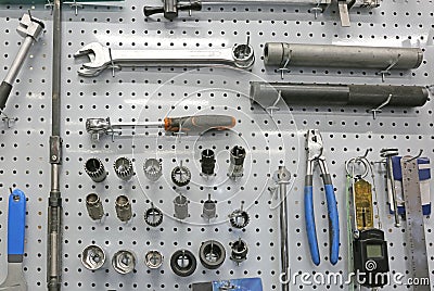 mechanical workshop tools hanging Stock Photo