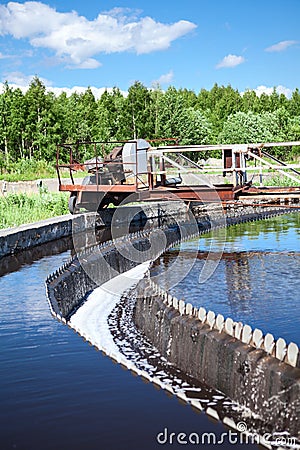 Mechanically driven scrapers in sedimentation tank Stock Photo