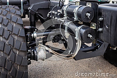 mechanisms and parts of independent hydropneumatic suspension of cars Stock Photo