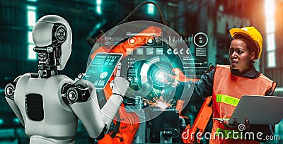 Mechanized industry robot and human worker working together in future factory Stock Photo