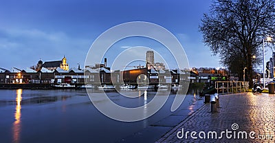 Mechelen, Belgium - April 2, 2019: The Towesr of Saint-Rombuld`s Cathedral and the Beguinage Church at blue hour Editorial Stock Photo