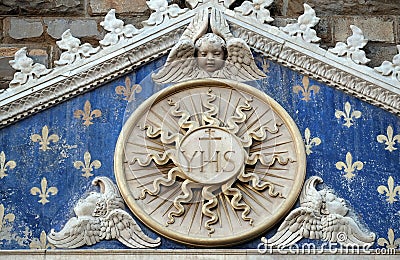 Medallion with the IHS monogram between two lions, Palazzo Vecchio in Florence Stock Photo