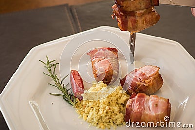 medallion, pork rolled in bacon served in churrascaria. Stock Photo