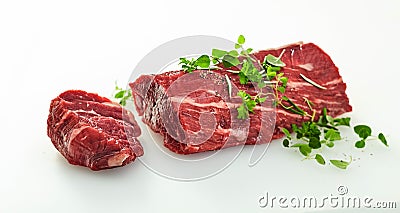 Medallion sliced off a whole raw beef fillet Stock Photo