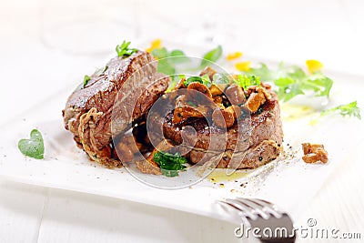 Medallions of fillet steak with wild mushrooms Stock Photo