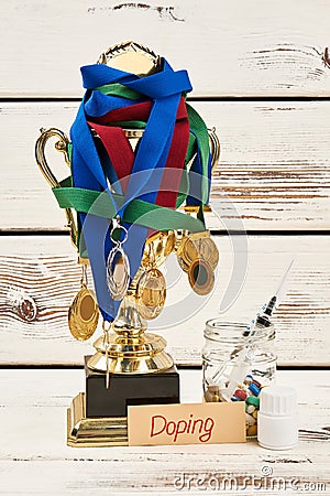Medals, trophy and doping drugs Stock Photo