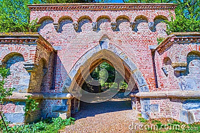 The medeival brick arched Neo-Gothic portal in Monza Royal Gardens (Giardini Reali di Monza), Italy Stock Photo