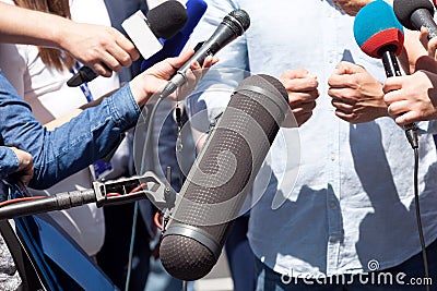 Media interview. News or press conference. Stock Photo