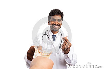 Medic receiving money as bribe Stock Photo