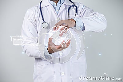 Medic shows in the hands of the brain Stock Photo