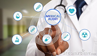 Medic touching medical audit text on display Stock Photo