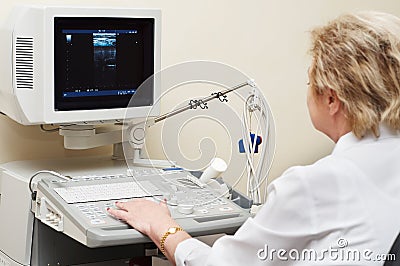 Medic using ultrasound system Stock Photo