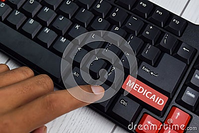 Medicaid isolated on laptop keyboard background Stock Photo