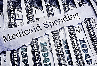 Medicaid Spending newspaper headline and cash Stock Photo