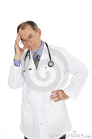 Caucasian doctor with a receding hairline wearing a white lab coat Stock Photo