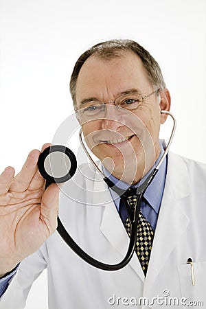 Caucasian male doctor or nurse wearing a lab coat with a stethoscope Stock Photo