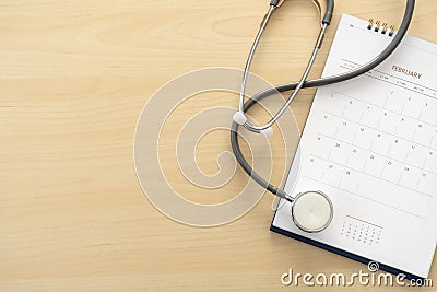 Medical appointment book in the calendar stethoscope and calendar schedule to check up Stock Photo