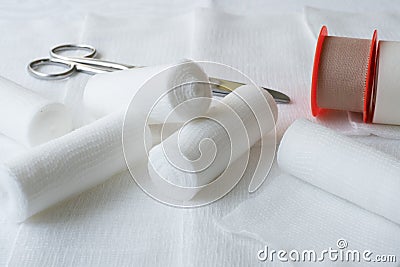 Medical bandages with scissors and sticking plaster. Stock Photo