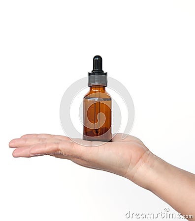 Medical bottle in hand Stock Photo