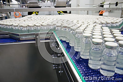 Medical bottles in pharmaceutical plant Stock Photo