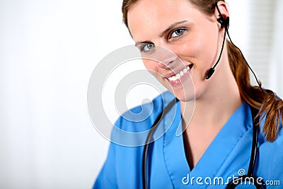 Medical callcenter operator female smiling Stock Photo