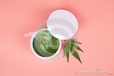 medical cannabis eye patches, cannabis and skin care on pink background top view Stock Photo