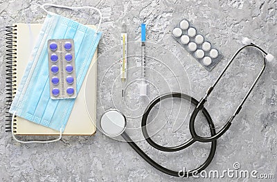 Medical cardiology equipment on a gray concrete background. Stet Stock Photo