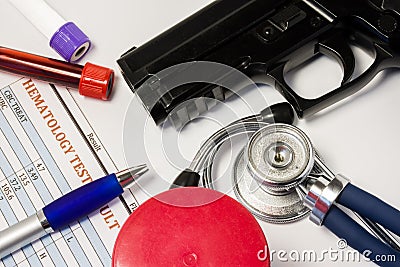 Medical certificate or clearance or doctor conclusion on carrying of weapons or gun permit. On white background of table are gun, Stock Photo