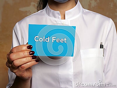 Medical concept about Cold Feet with phrase on the piece of paper Stock Photo