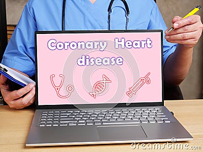 Medical concept meaning Coronary Heart disease with phrase on the piece of paper Stock Photo