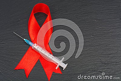 Medical concept, red ribbon-symbol of AIDS Day, December 1st Stock Photo