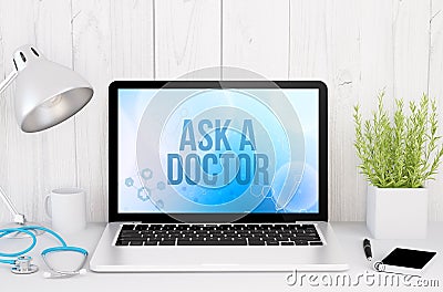 medical desktop computer with ask a doctor on screen Stock Photo