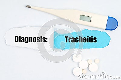 Medical diagnosis. On paper a thermometer, pills and a hole, inside which the inscription - Tracheitis Stock Photo