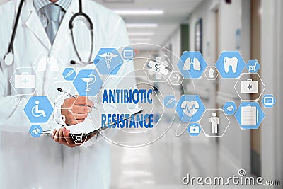 Medical Doctor and ANTIBIOTIC RESISTANCE words in Medical network connection on the virtual screen on hospital background Stock Photo