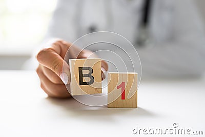 Medical Doctor Hand With Vitamin B1 Stock Photo