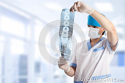 Medical doctor looking at x-ray picture Stock Photo