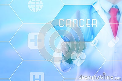 Medical doctor pressing 'Cancer' button on virtual touch screen on blue technology background Stock Photo