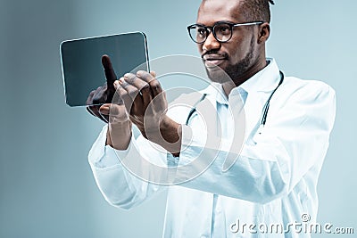 Medical doctor, tablet, bioinformatics, telemedicine Stock Photo